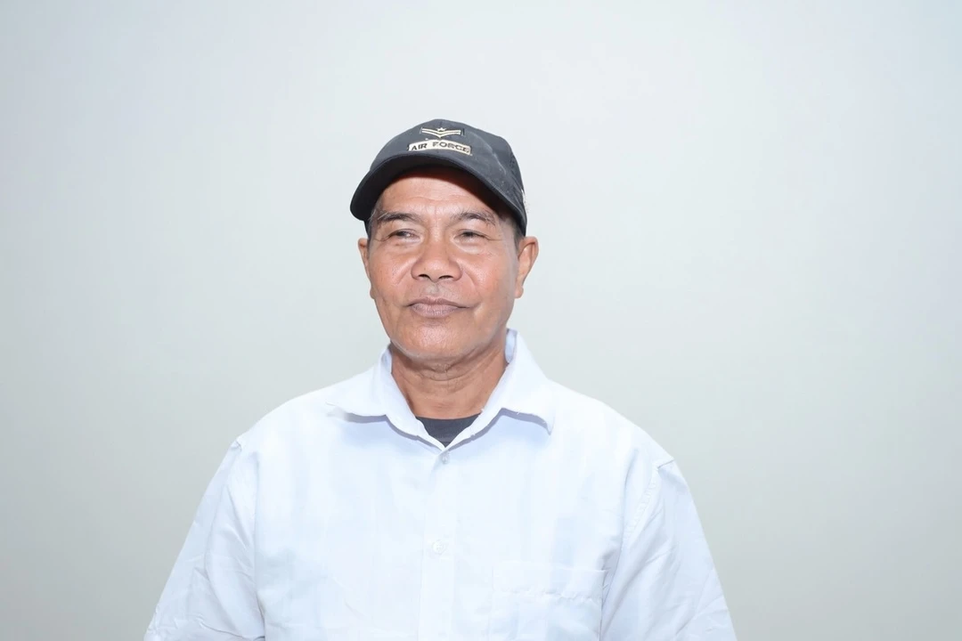 Senyum Hasan Sambut Program Bedah Rumah